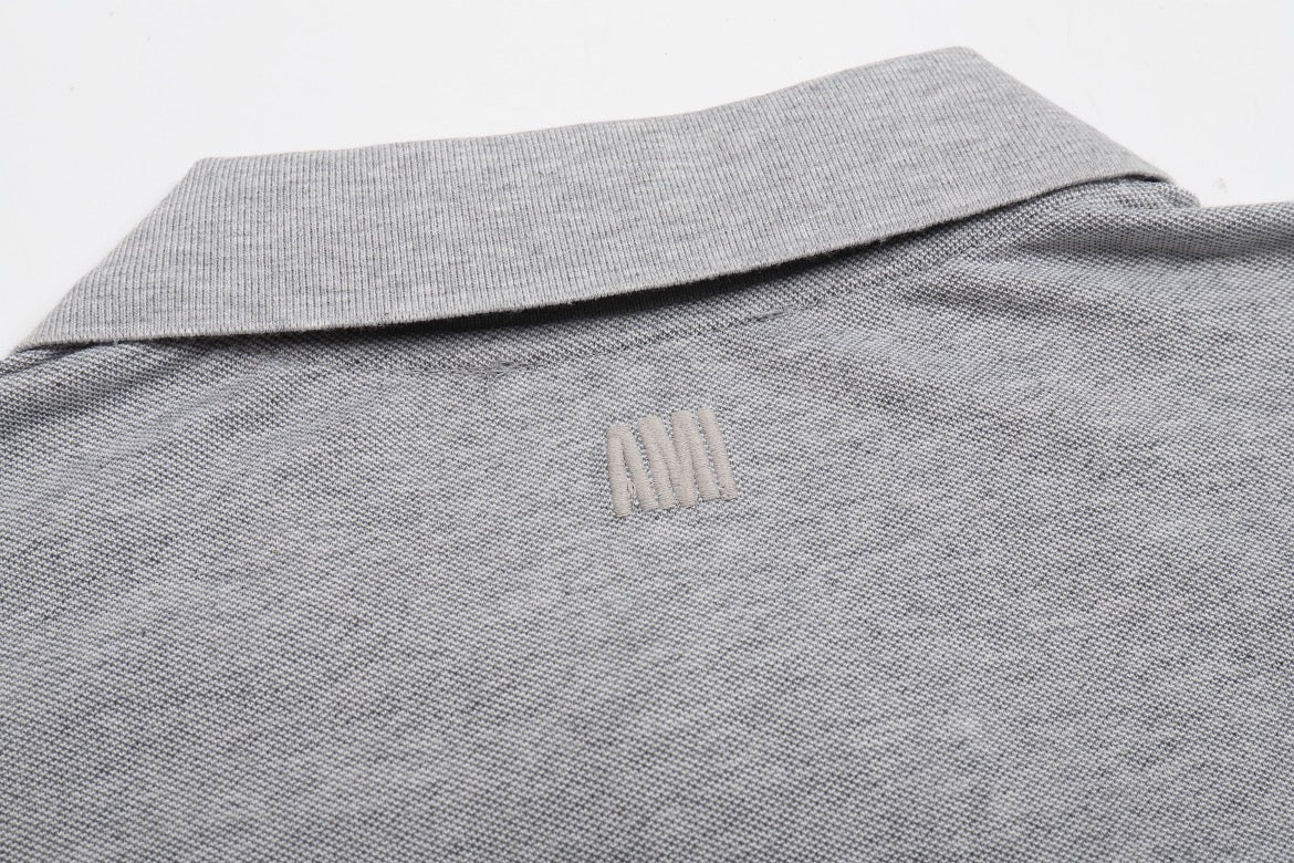 Polo gris à petit logo ami de cœur gris