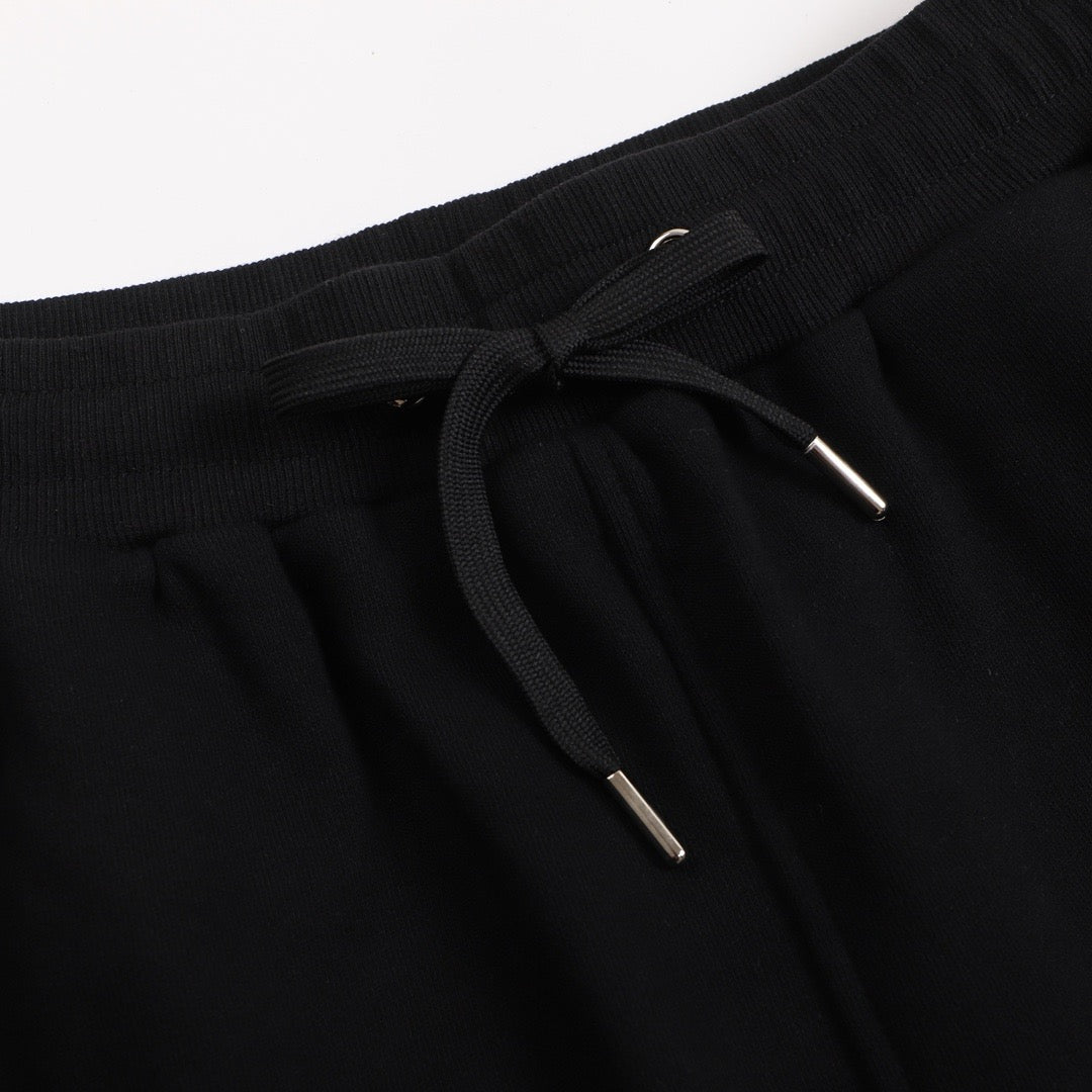 Short noir à petit logo ami de cœur blanc