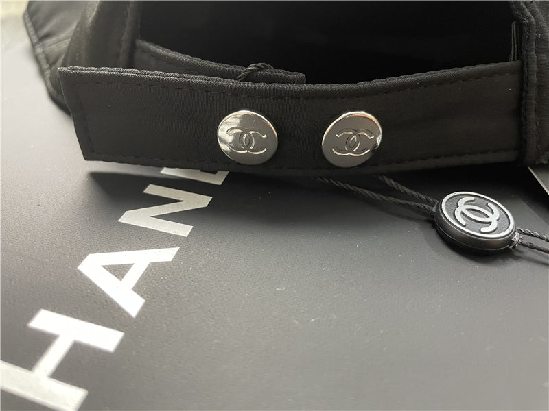 Black chn cap with ticket