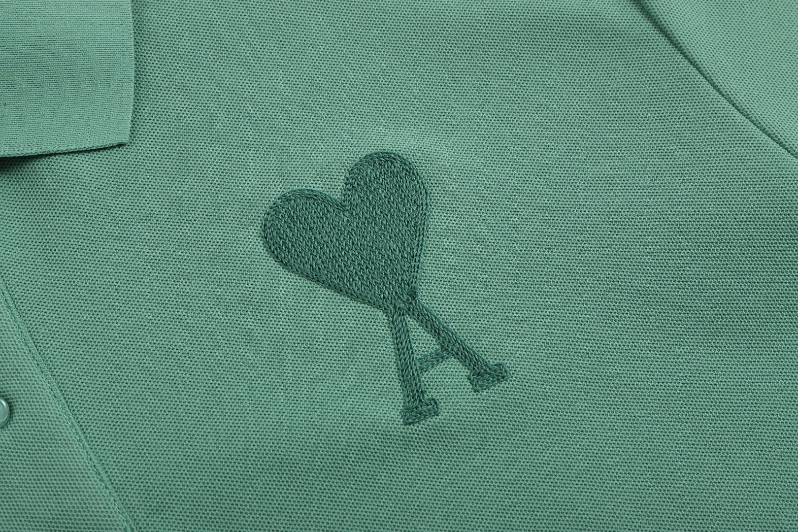 Polo vert à petit logo ami de cœur vert