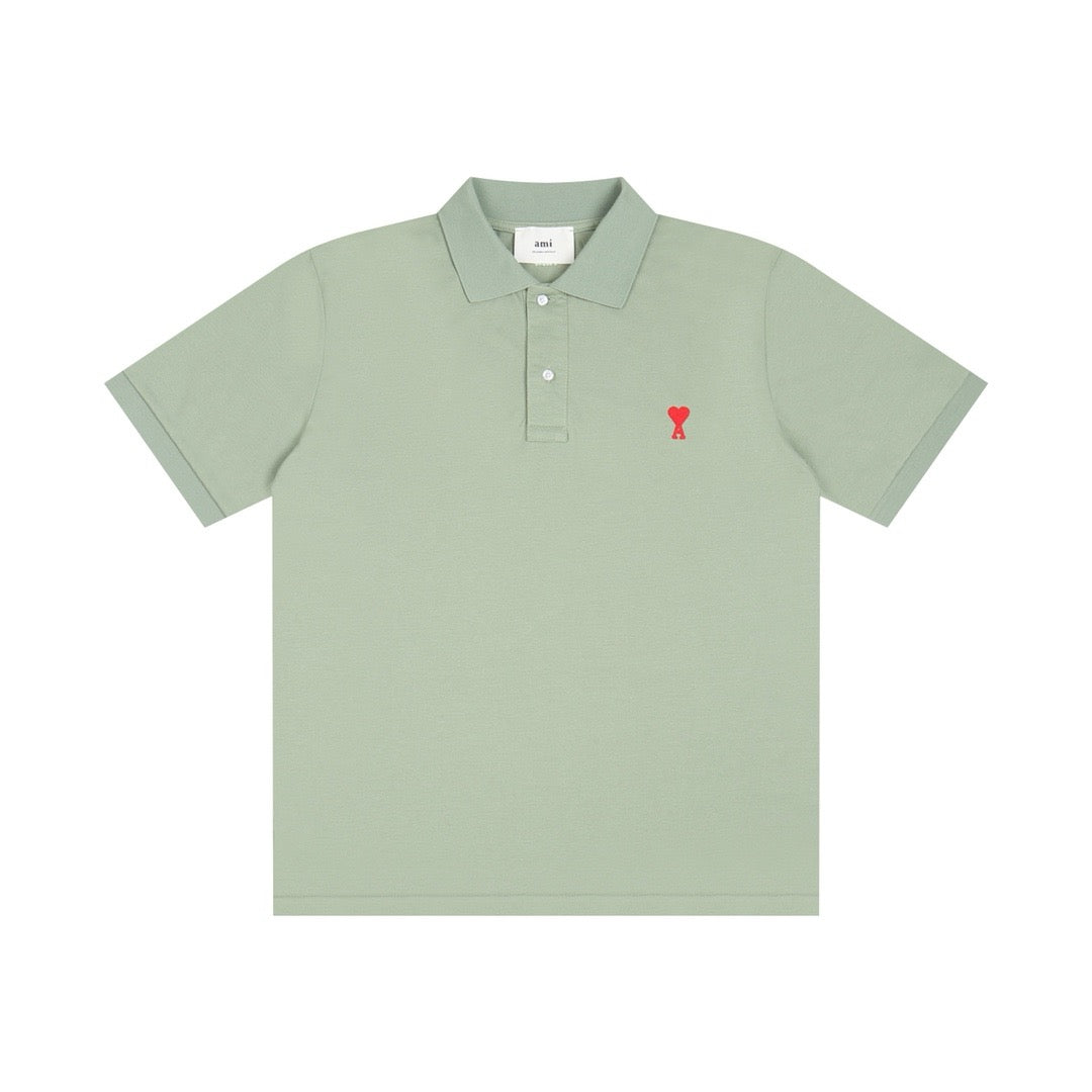 Polo vert à petit logo ami de cœur rouge
