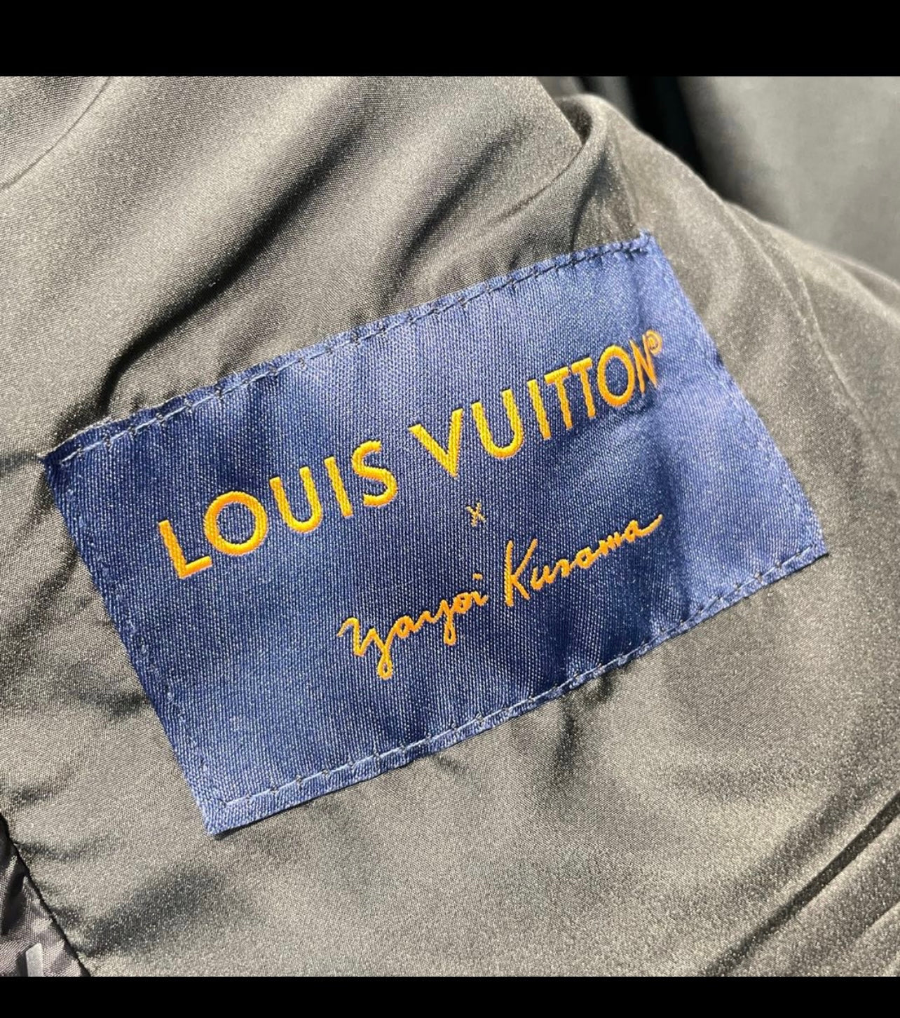 Doudoune lv x Yk facture 2023