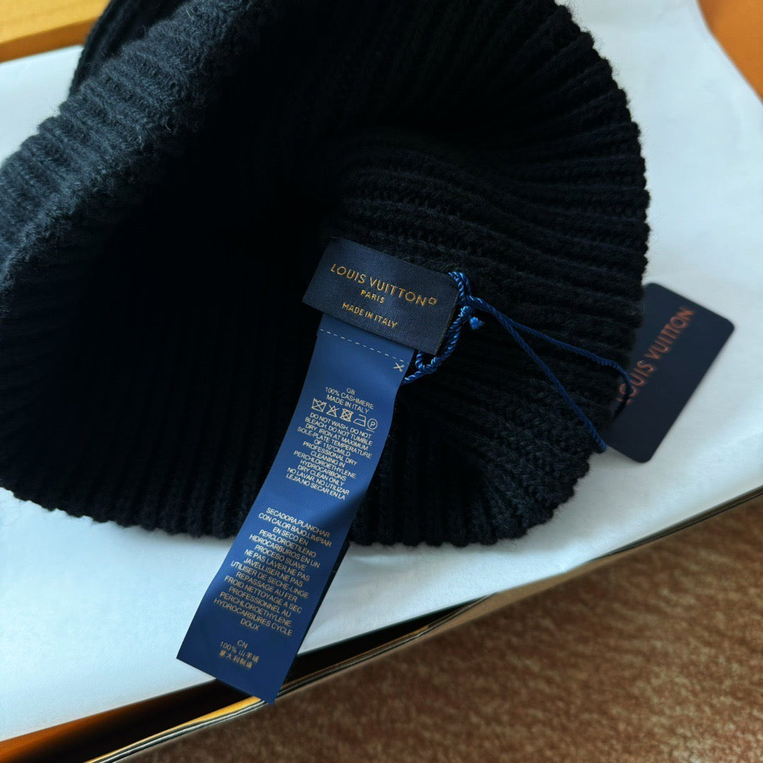 Black Lv hat with ticket