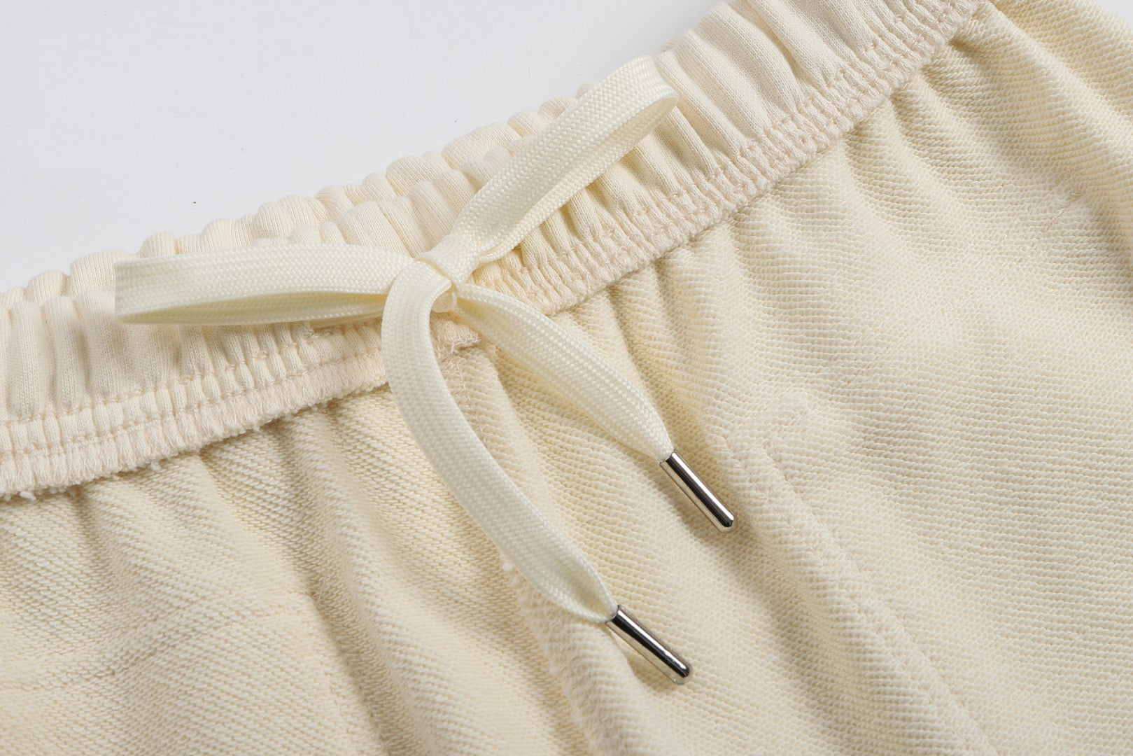 Short beige à petit logo ami de cœur beige