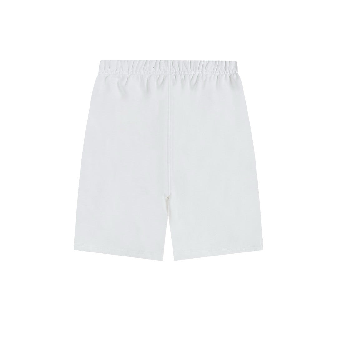 Short blanc à petit logo ami de cœur rouge