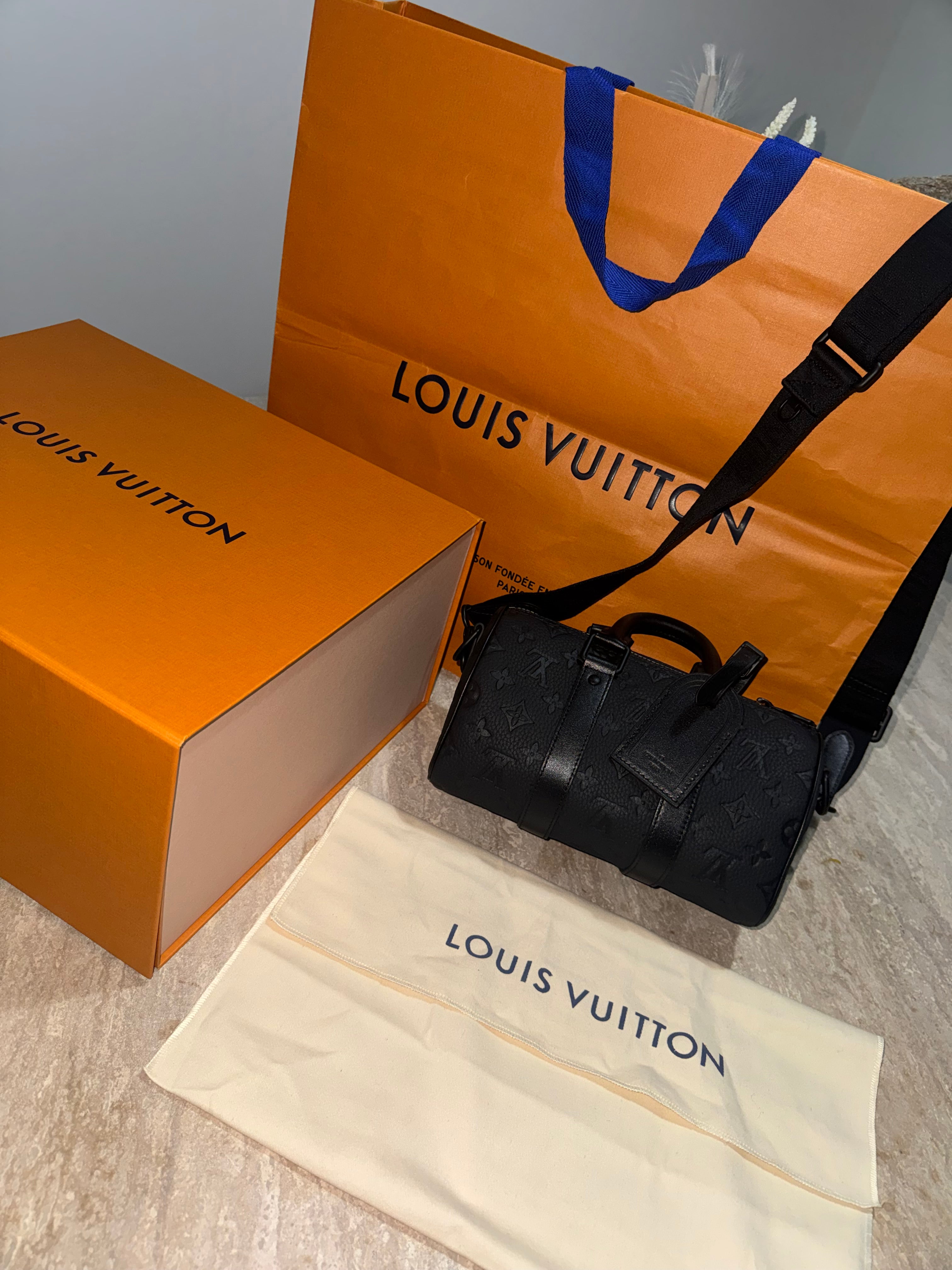 Keepall black bag invoice 10/10