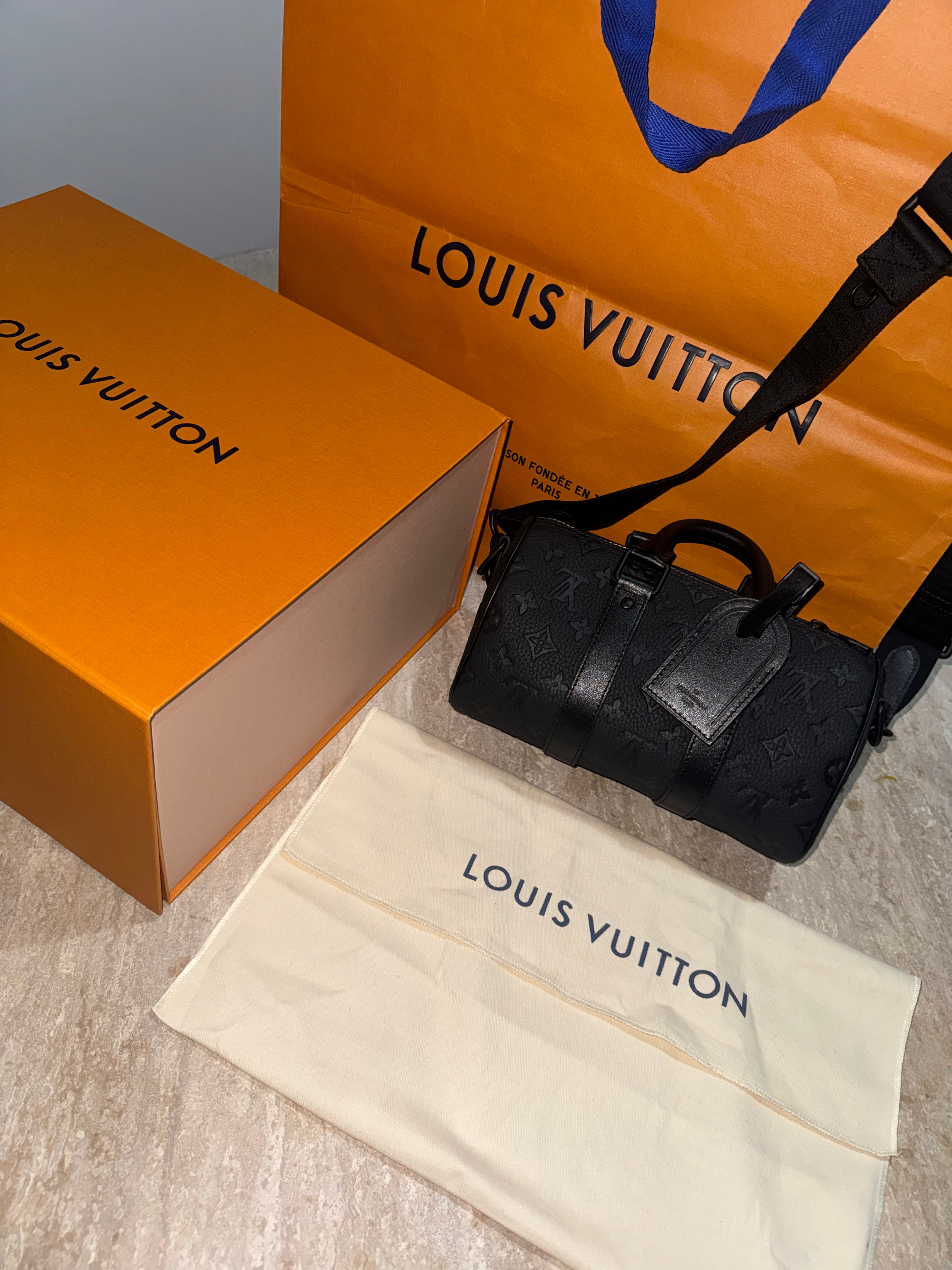 Keepall black bag invoice 10/10