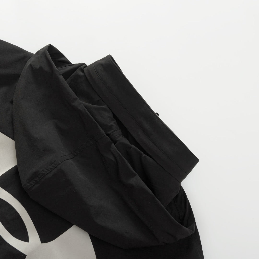 COUPE-VENT UNDER ARMR x BLNCG ® POUR HOMME EN NOIR