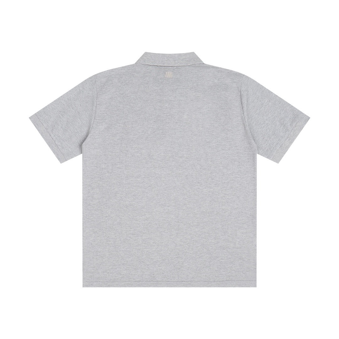 Polo gris à petit logo ami de cœur rouge