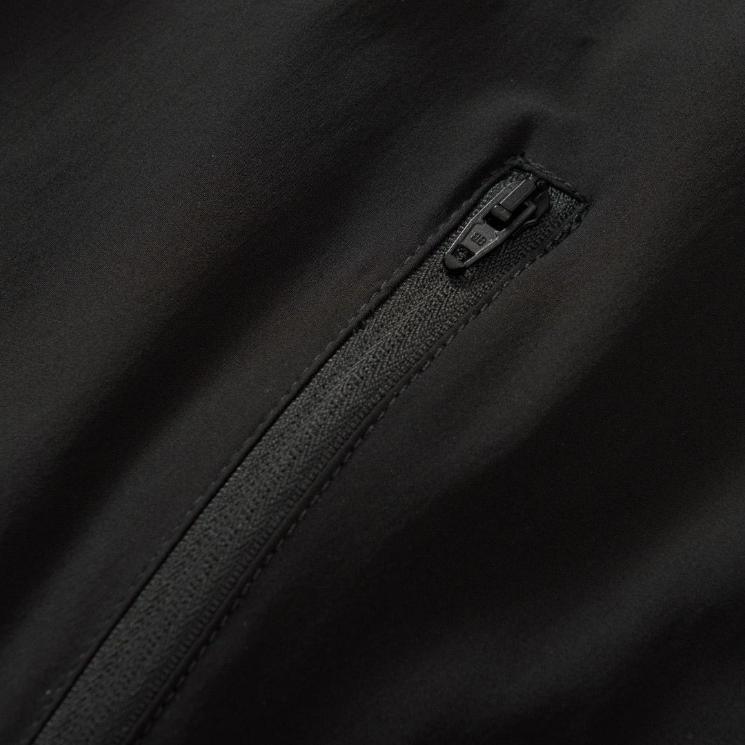 COUPE-VENT UNDER ARMR x BLNCG ® POUR HOMME EN NOIR