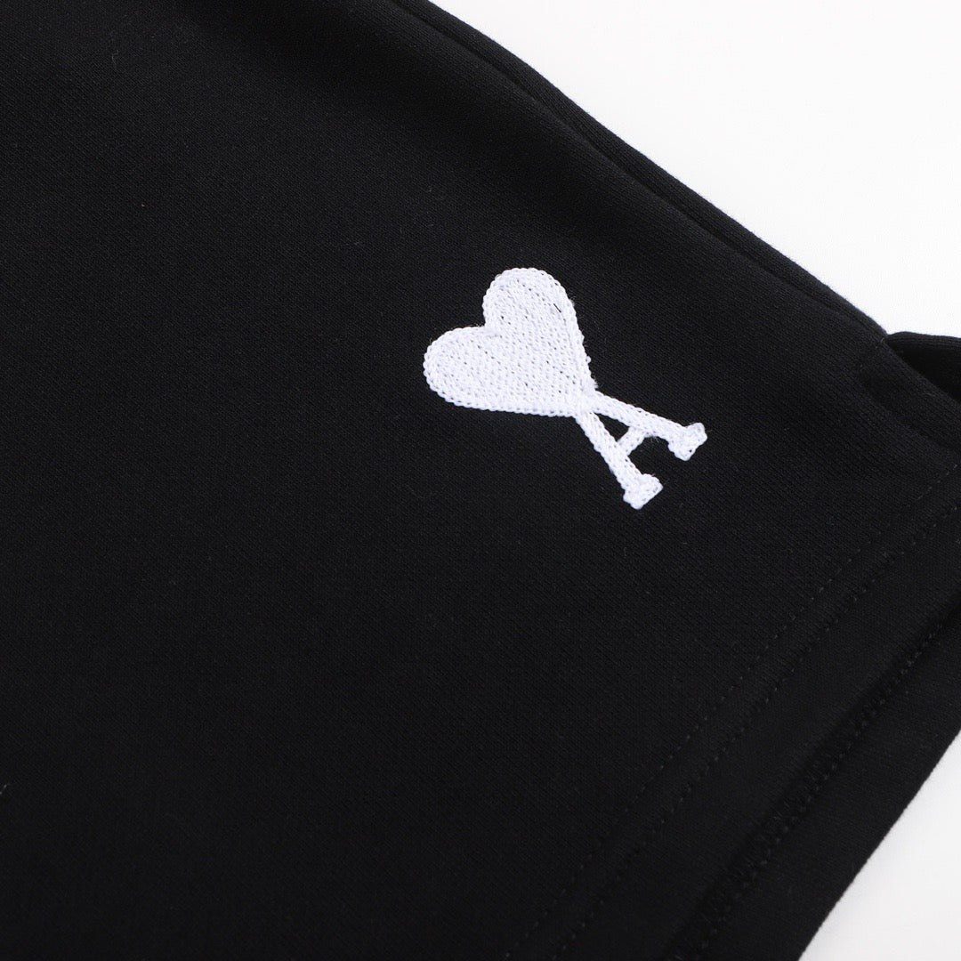 Short noir à petit logo ami de cœur blanc