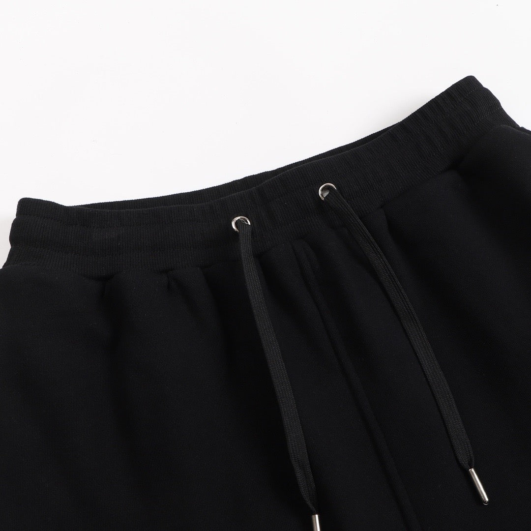 Short noir à petit logo ami de cœur blanc