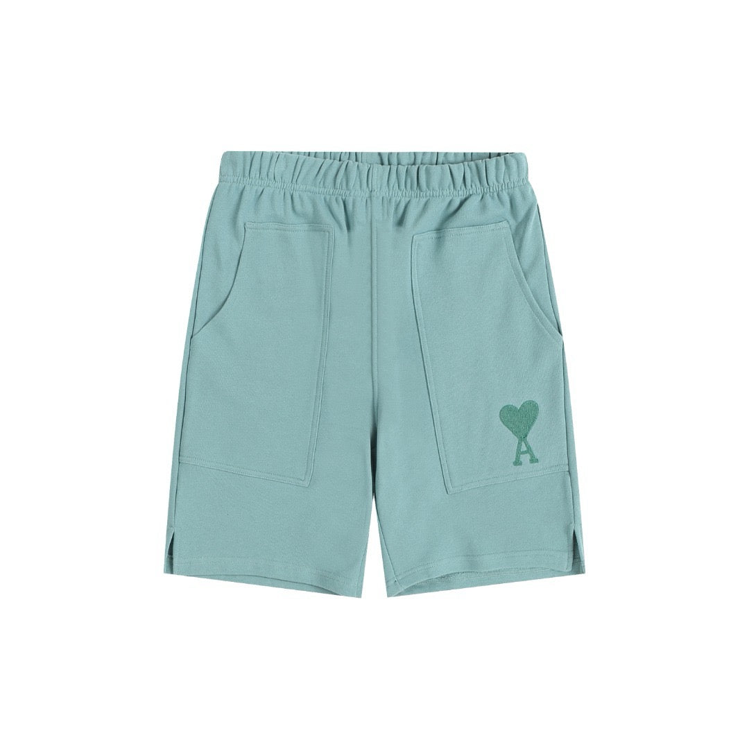 Short pistache à petit logo ami de cœur vert