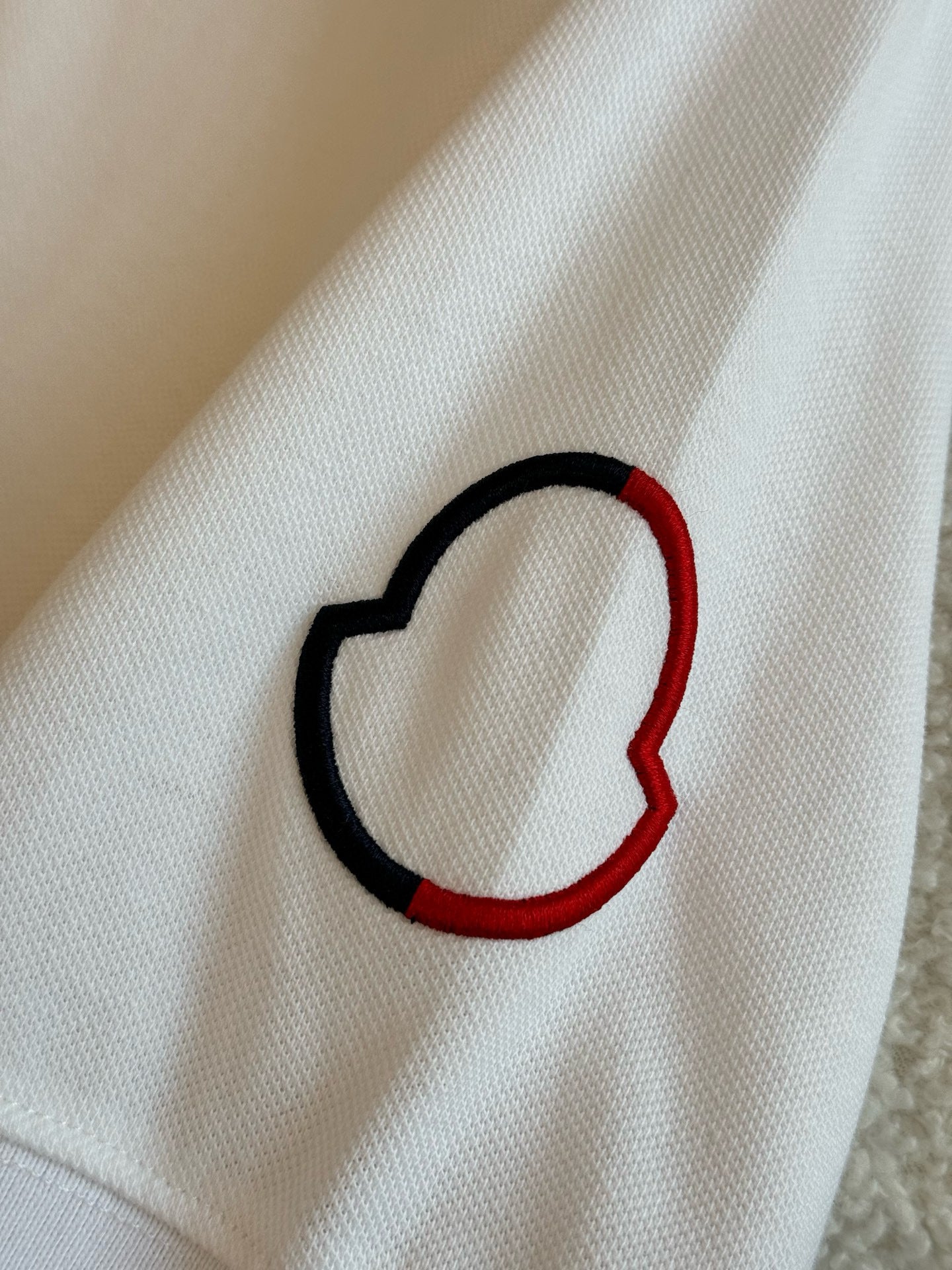 Mnclr Polo patch a logo blanc