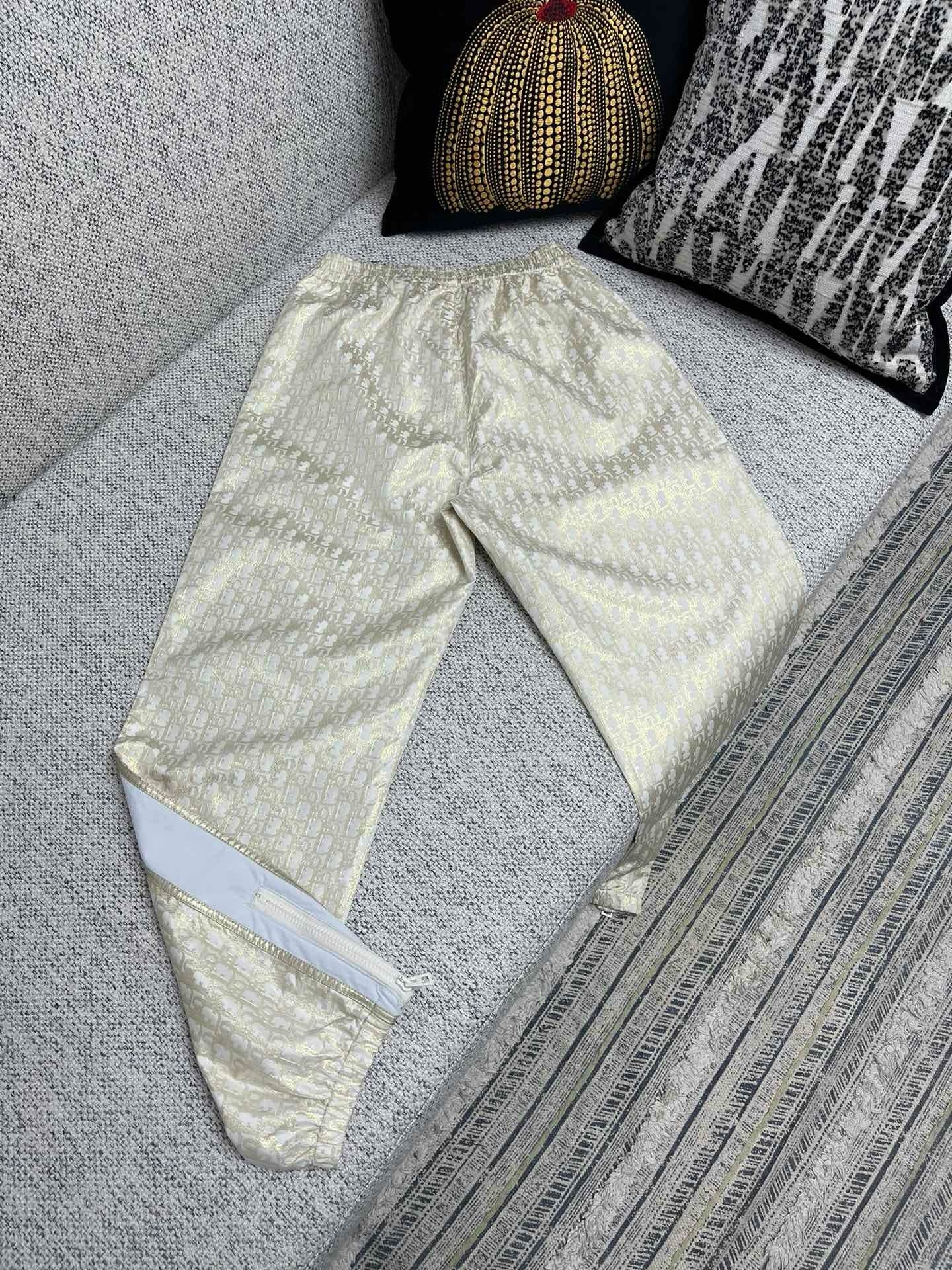 Ensemble imperméable à capuche CD Or