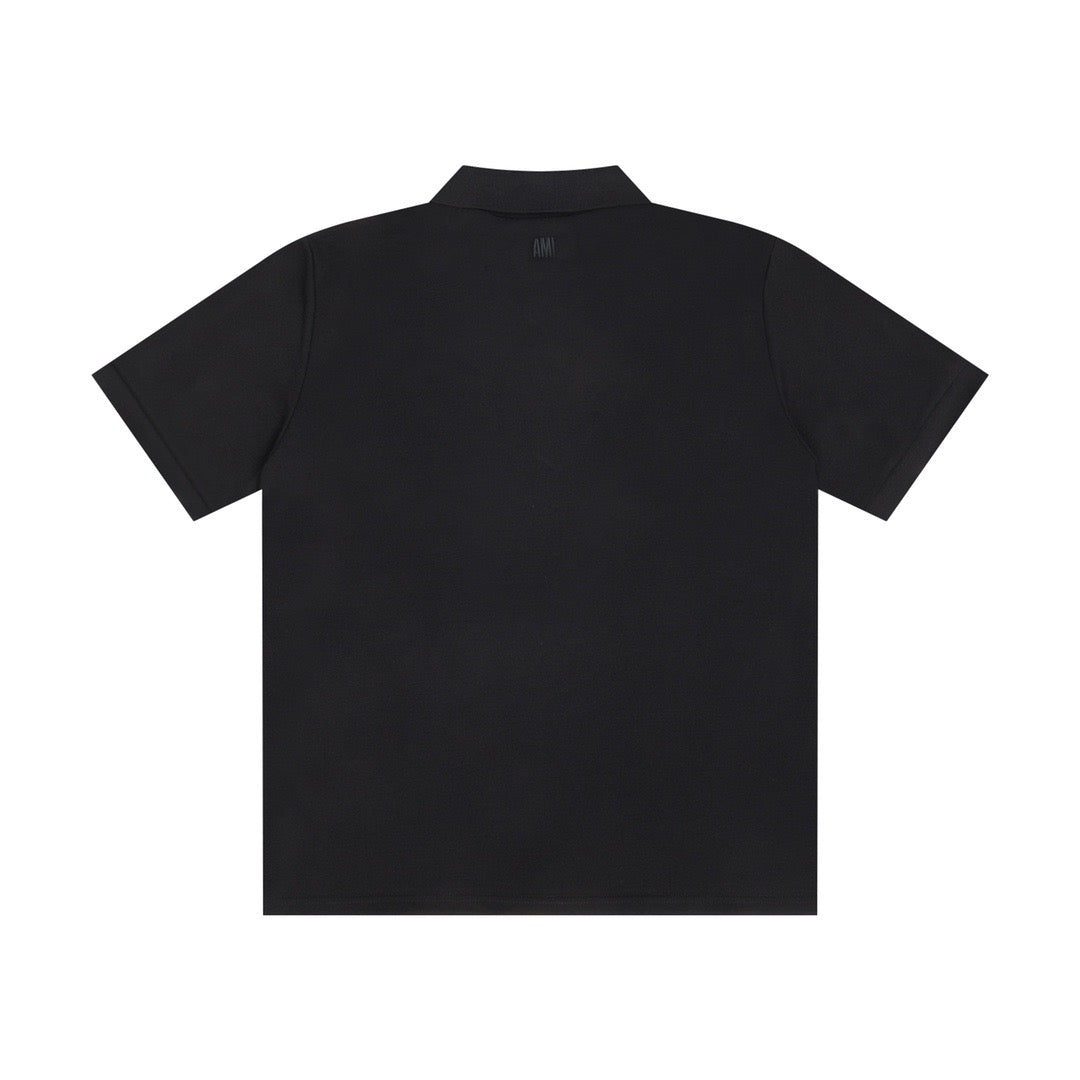 Polo noir à petit logo ami de cœur rouge