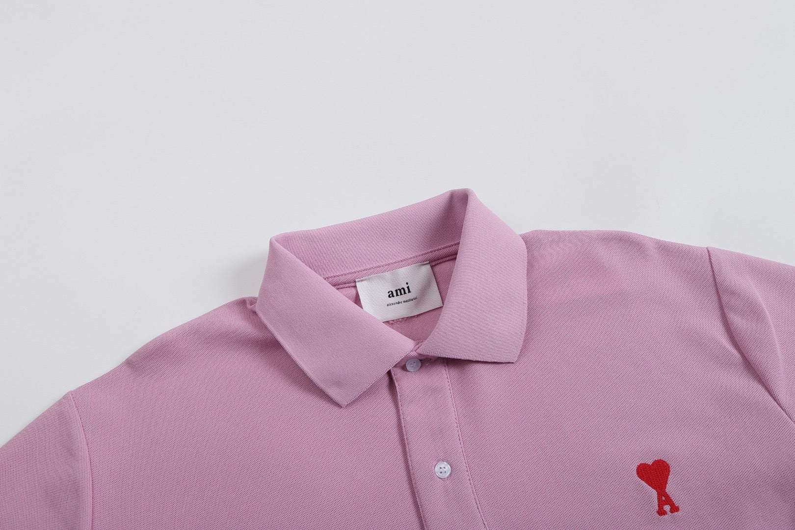 Polo purple à petit logo ami de cœur rouge