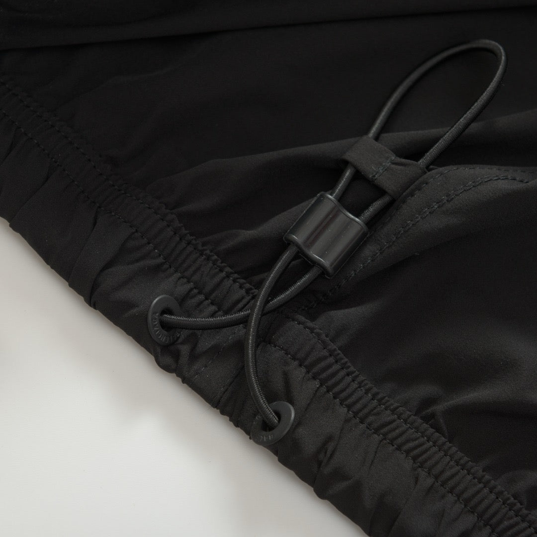 COUPE-VENT UNDER ARMR x BLNCG ® POUR HOMME EN NOIR