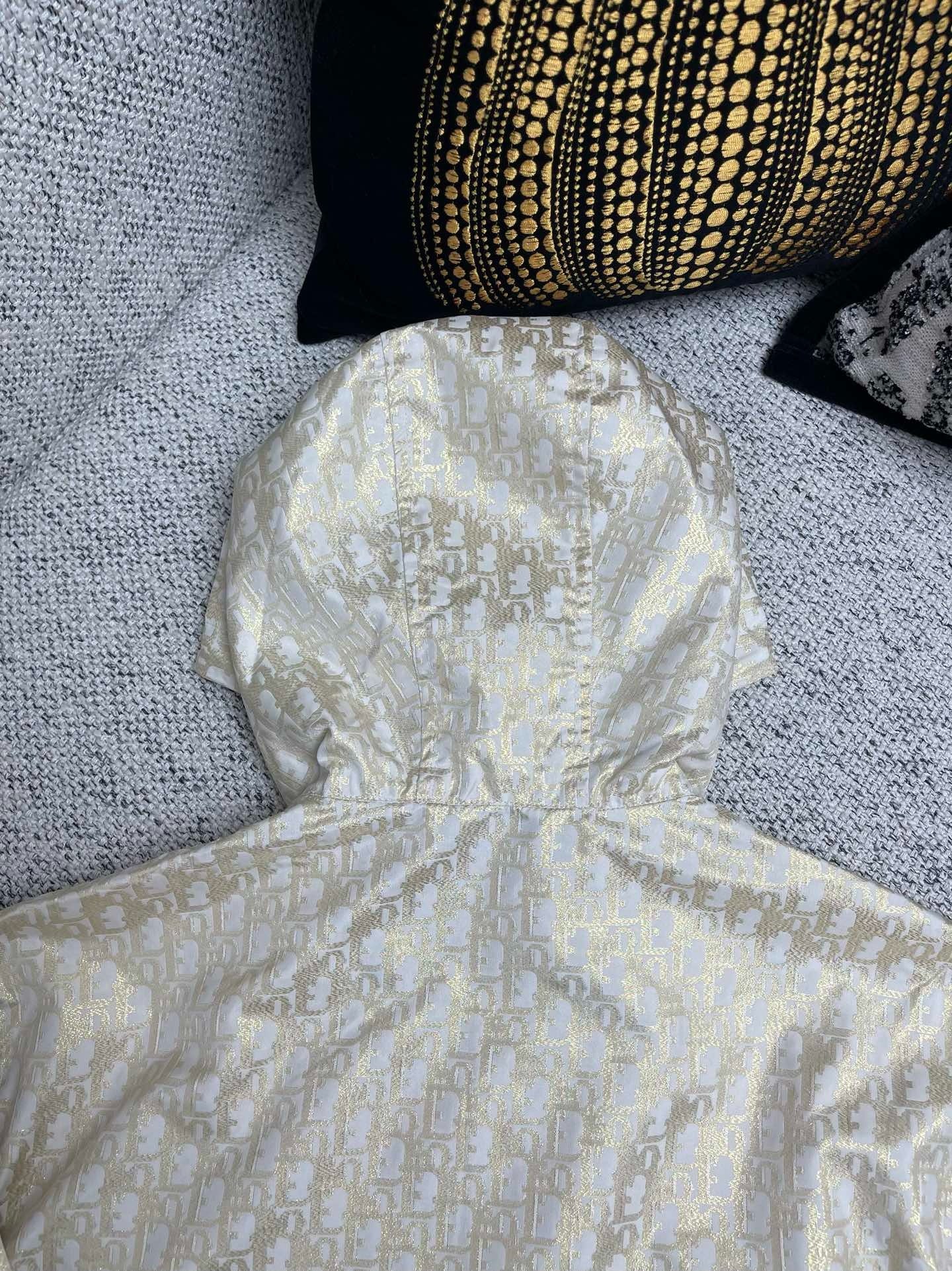 Ensemble imperméable à capuche CD Or