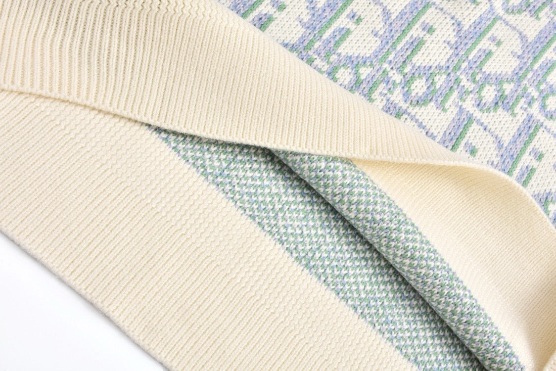 Pull CD Oblique Jacquard de laine vierge blanche et bleue