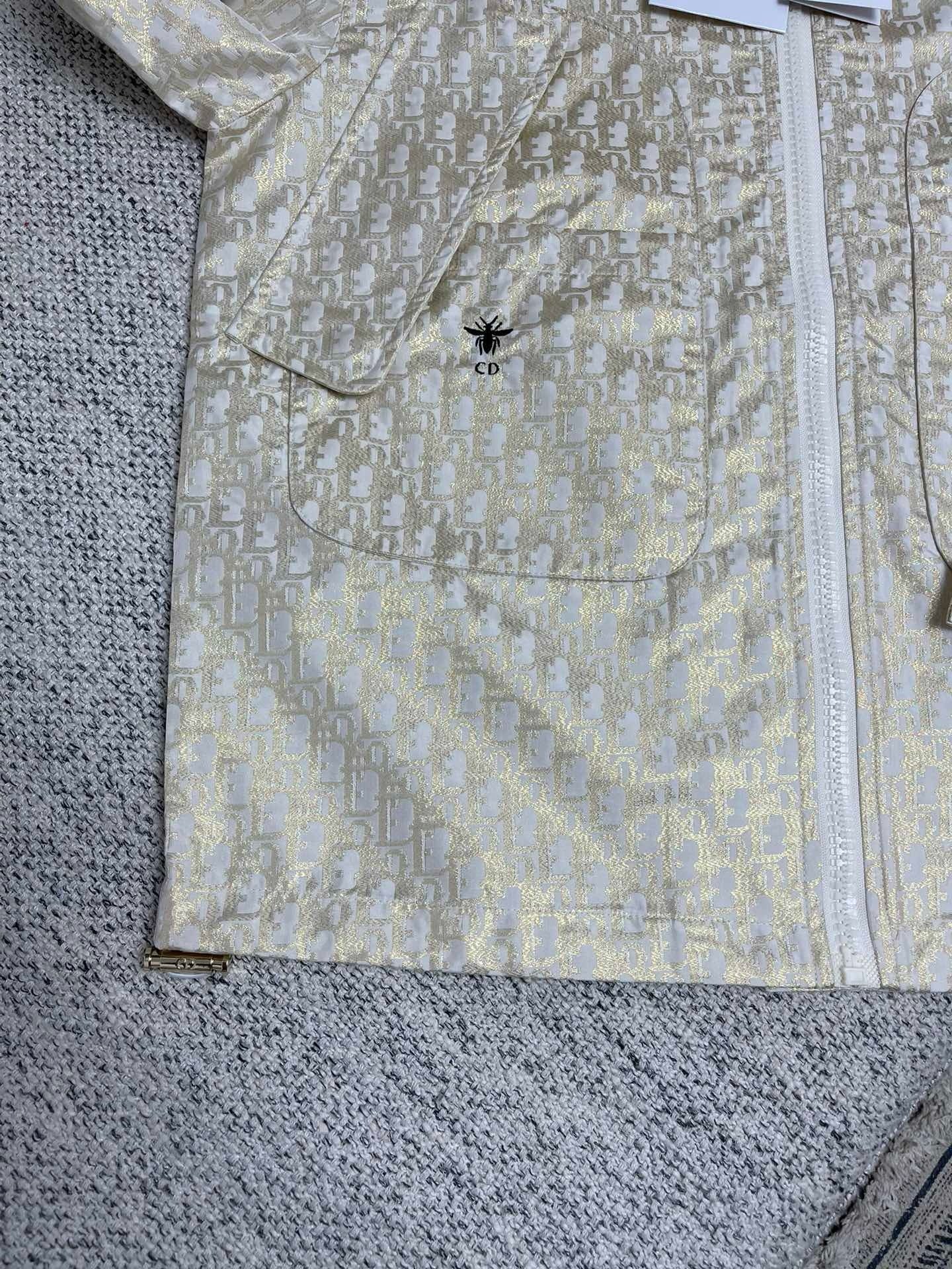 Ensemble imperméable à capuche CD Or