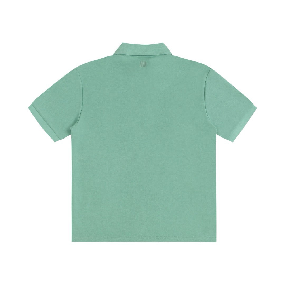 Polo vert à petit logo ami de cœur vert