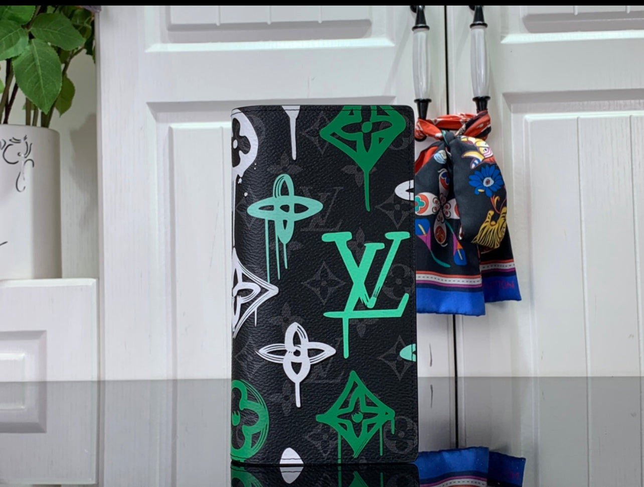 Lv coin purse and card holder.