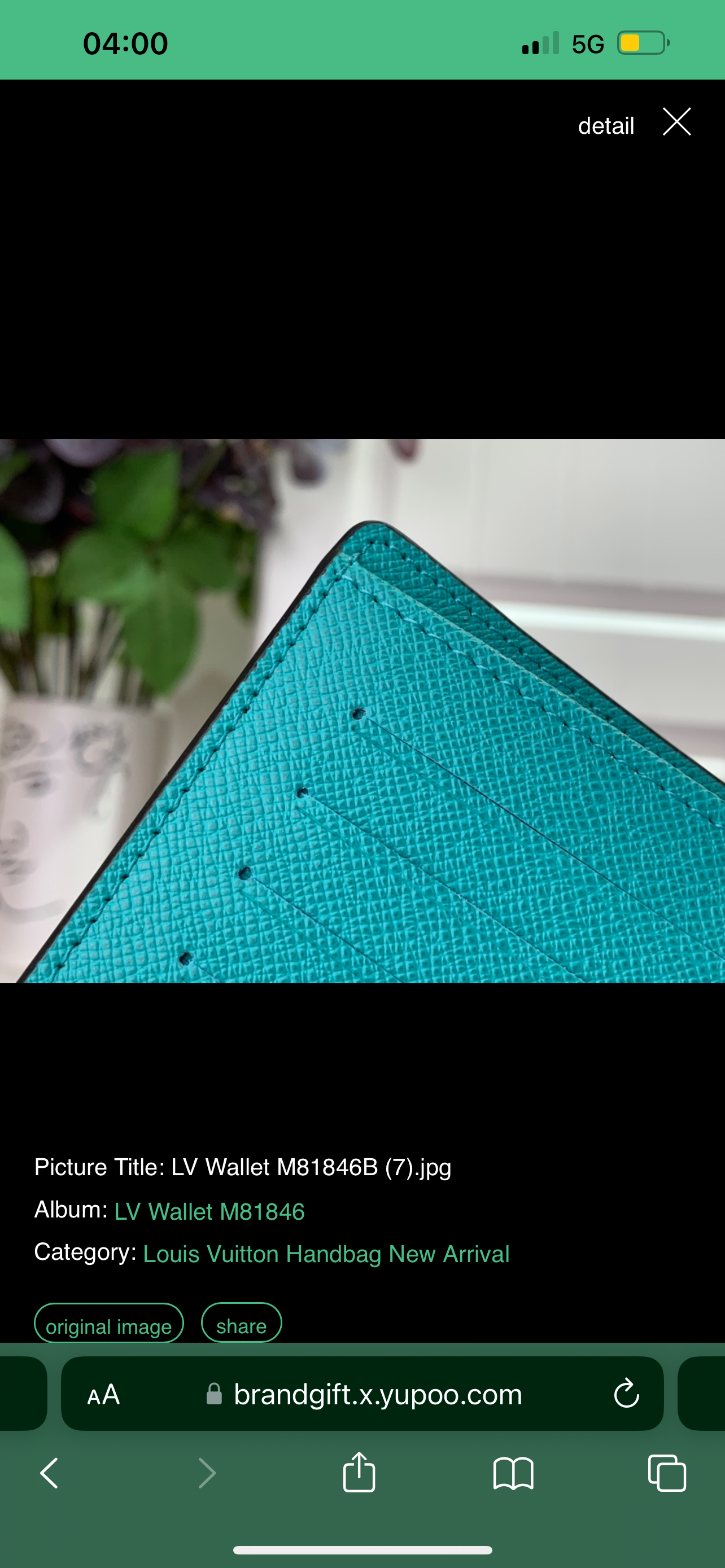 Lv coin purse and card holder.