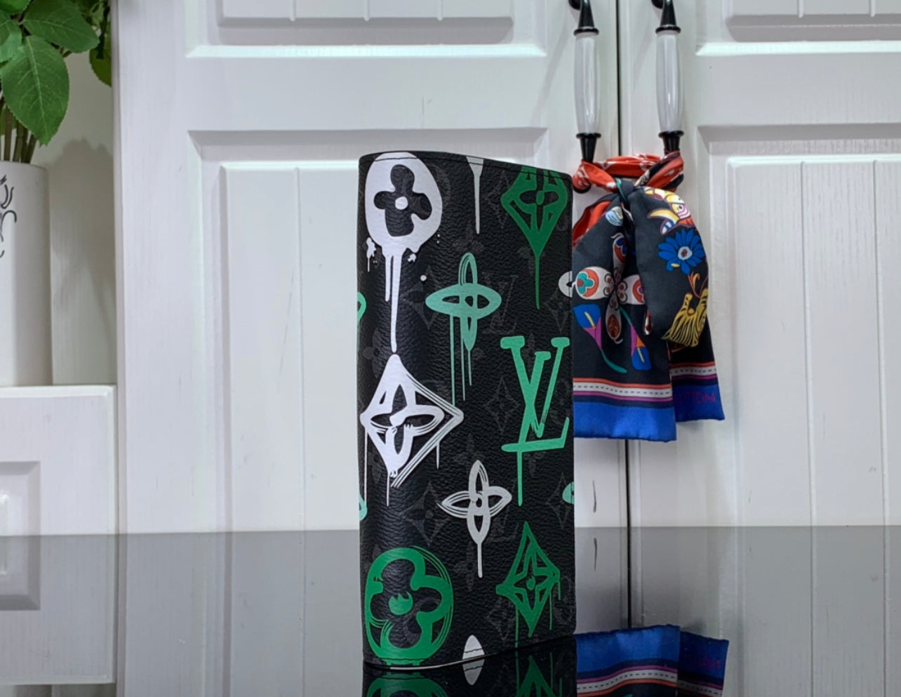 Lv coin purse and card holder.