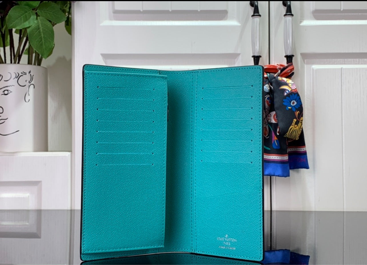 Lv coin purse and card holder.