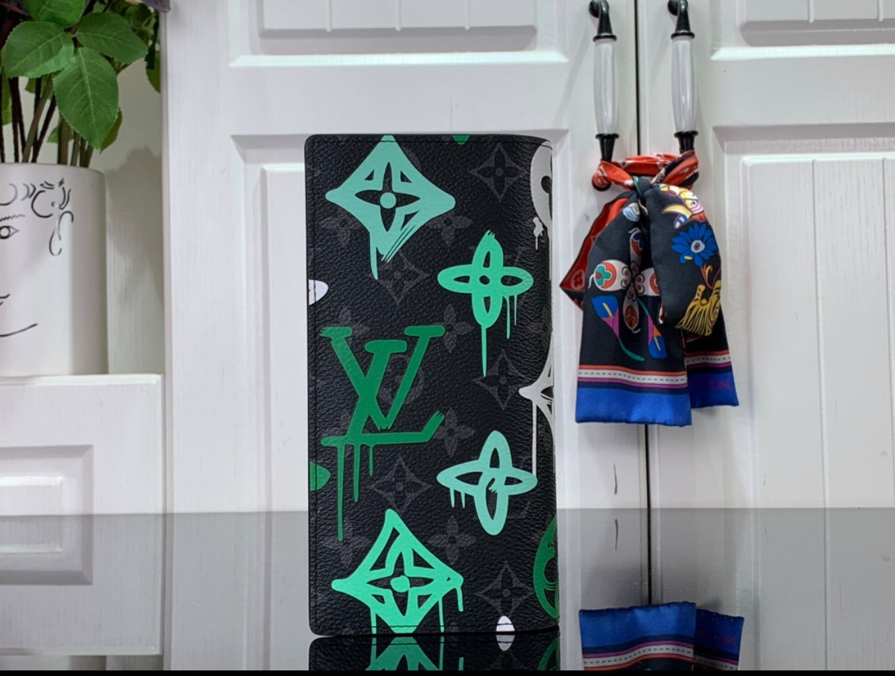 Lv coin purse and card holder.