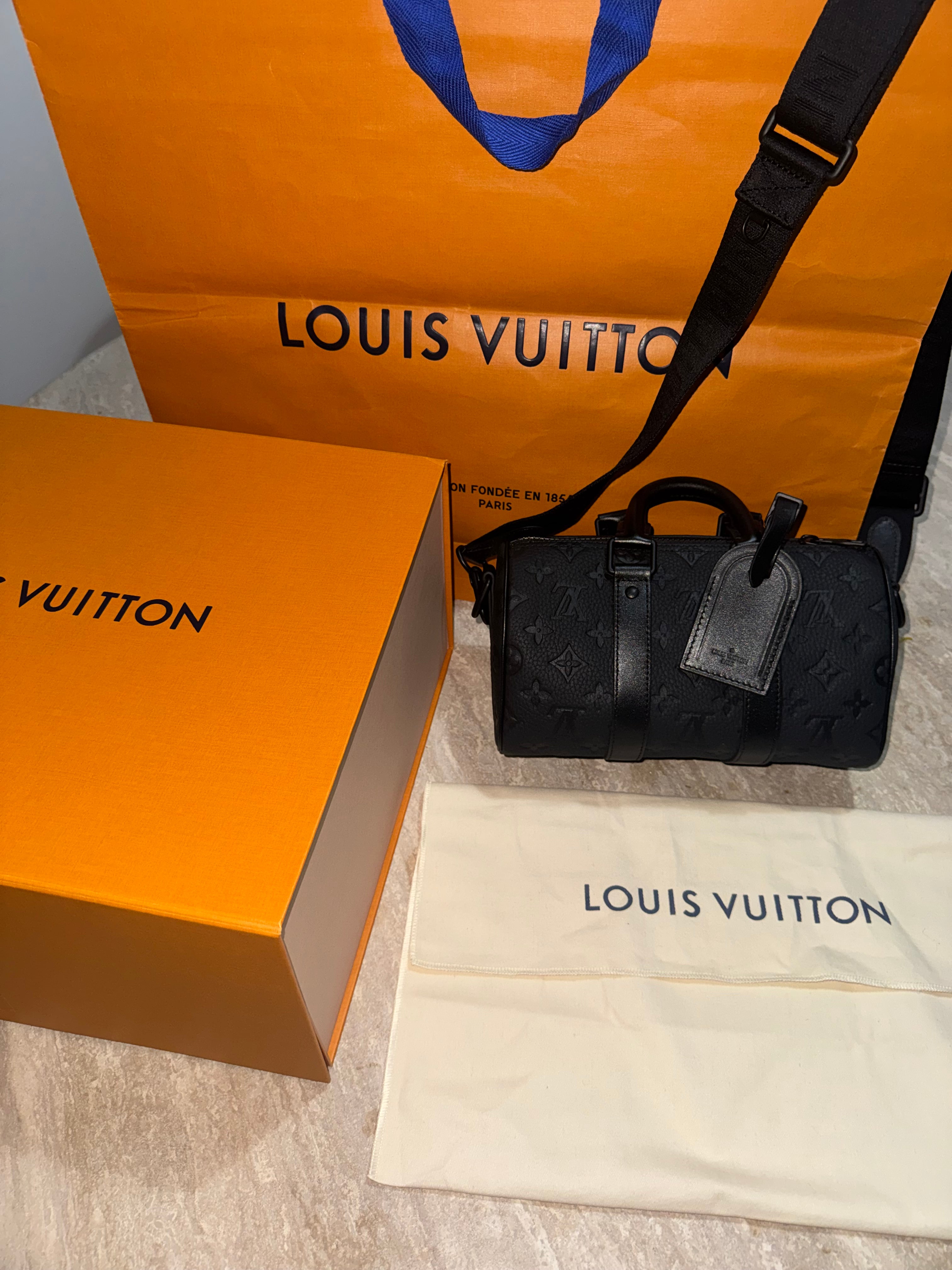 Keepall black bag invoice 10/10