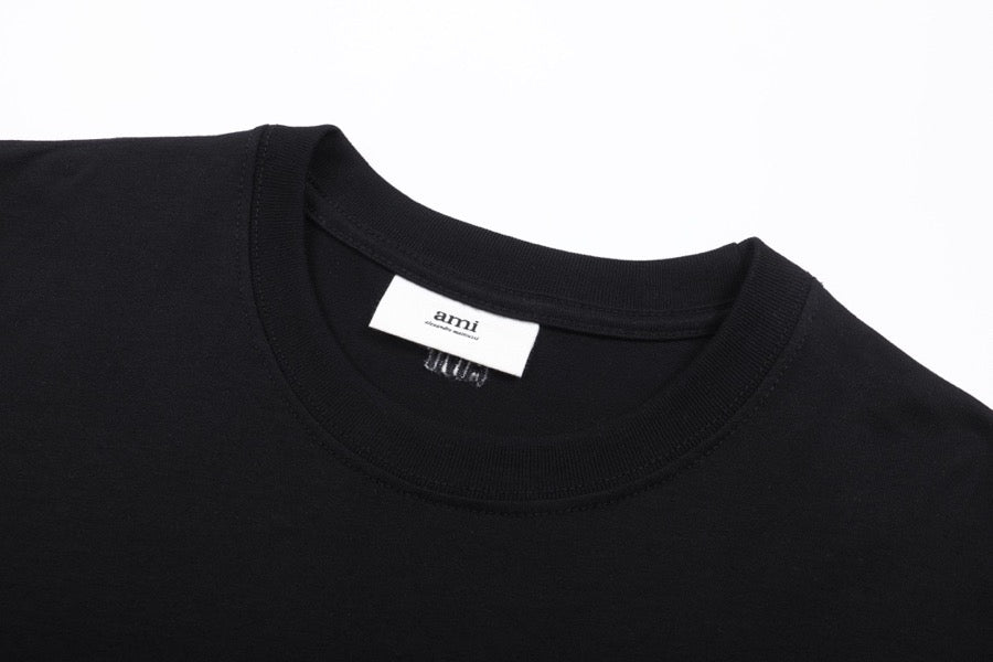T-shirt noir  à petit logo ami de cœur noir