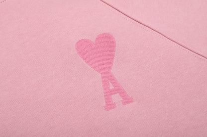 Sweat rose à petit logo ami de cœur rose