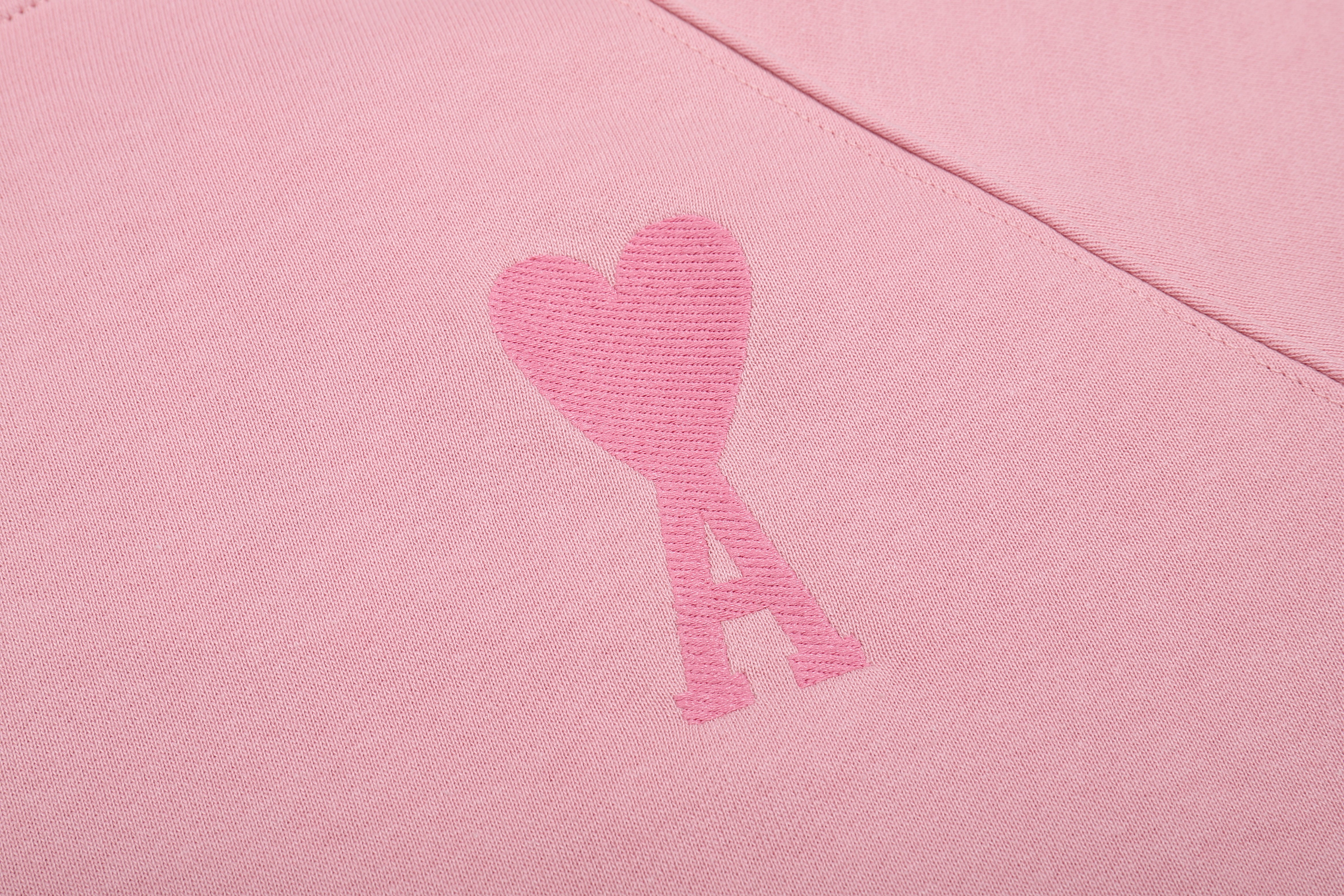 Sweat rose à petit logo ami de cœur rose