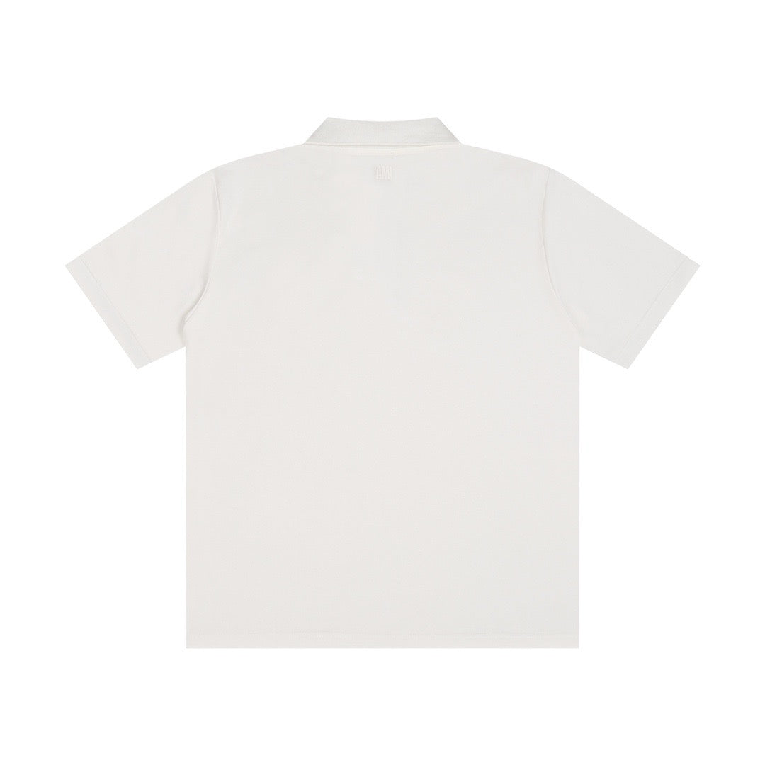 Polo blanc à petit logo ami de cœur rouge