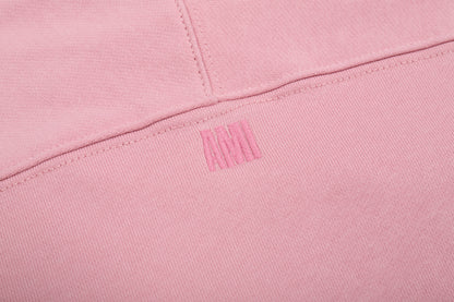 Sweat rose à petit logo ami de cœur rose
