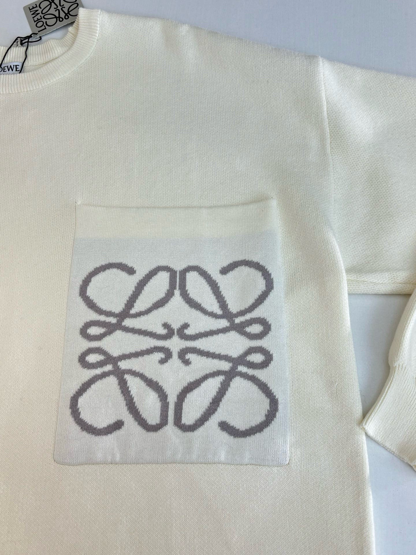 Pull coton poche Anagram Loew 10/10