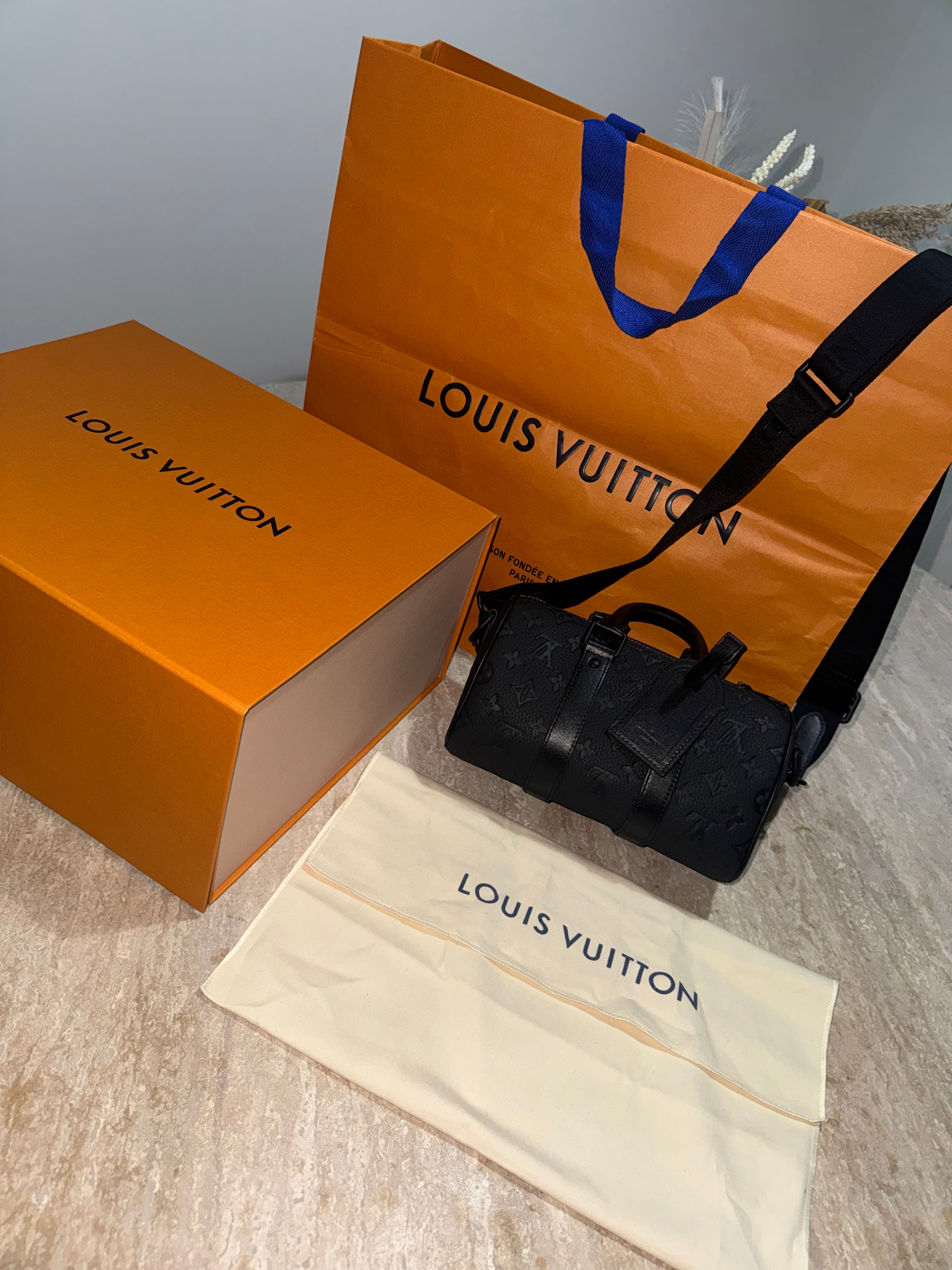 Keepall black bag invoice 10/10