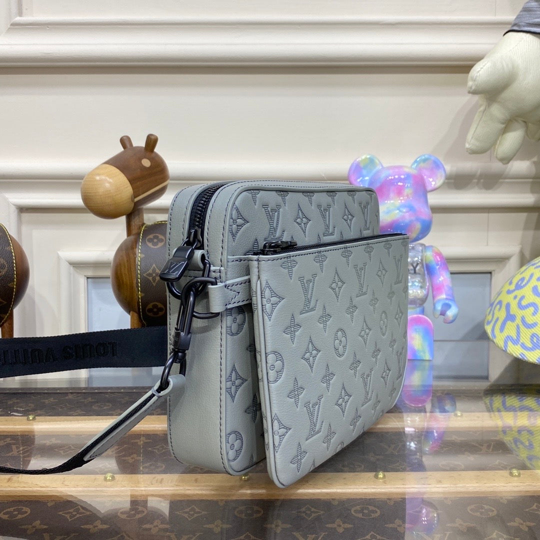 Sac Trio Messenger  grey 10/10 facture