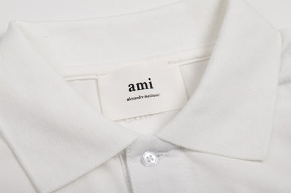 Polo blanc à petit logo ami de cœur rouge