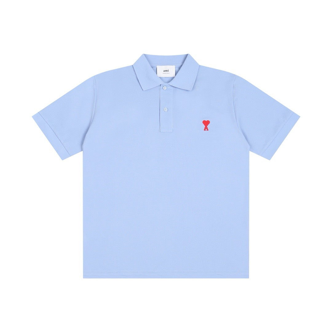 Polo bleu  à petit logo ami de cœur rouge