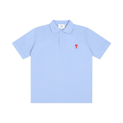 Polo bleu  à petit logo ami de cœur rouge