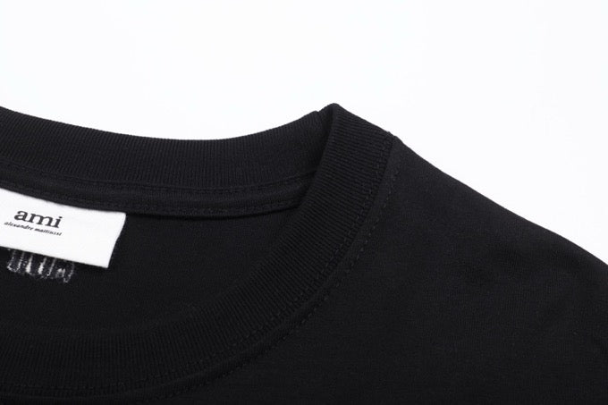 T-shirt noir  à petit logo ami de cœur noir