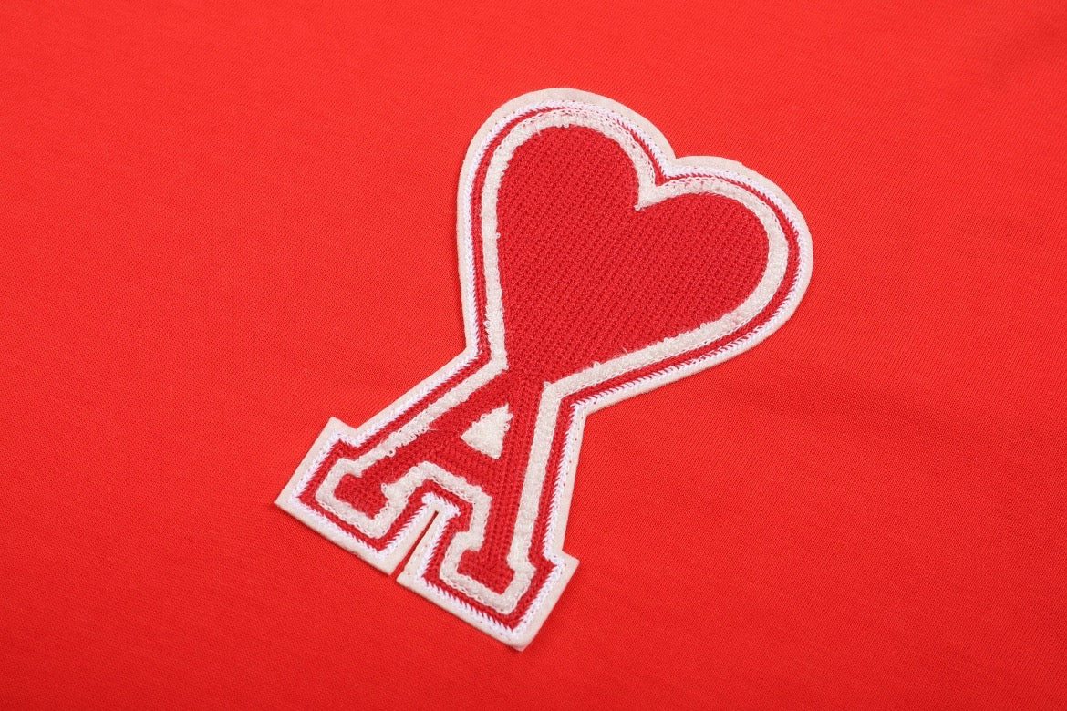 T-shirt rouge  à logo ami de cœur rouge