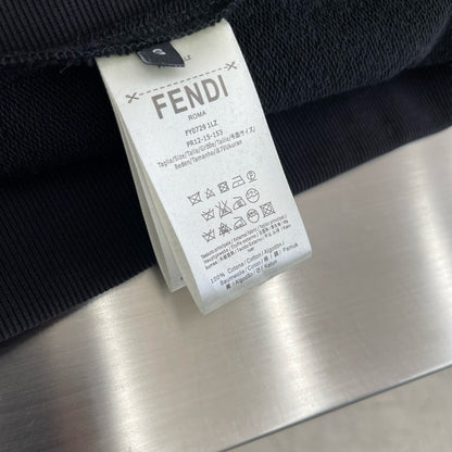 Pull FF noir poche zippée