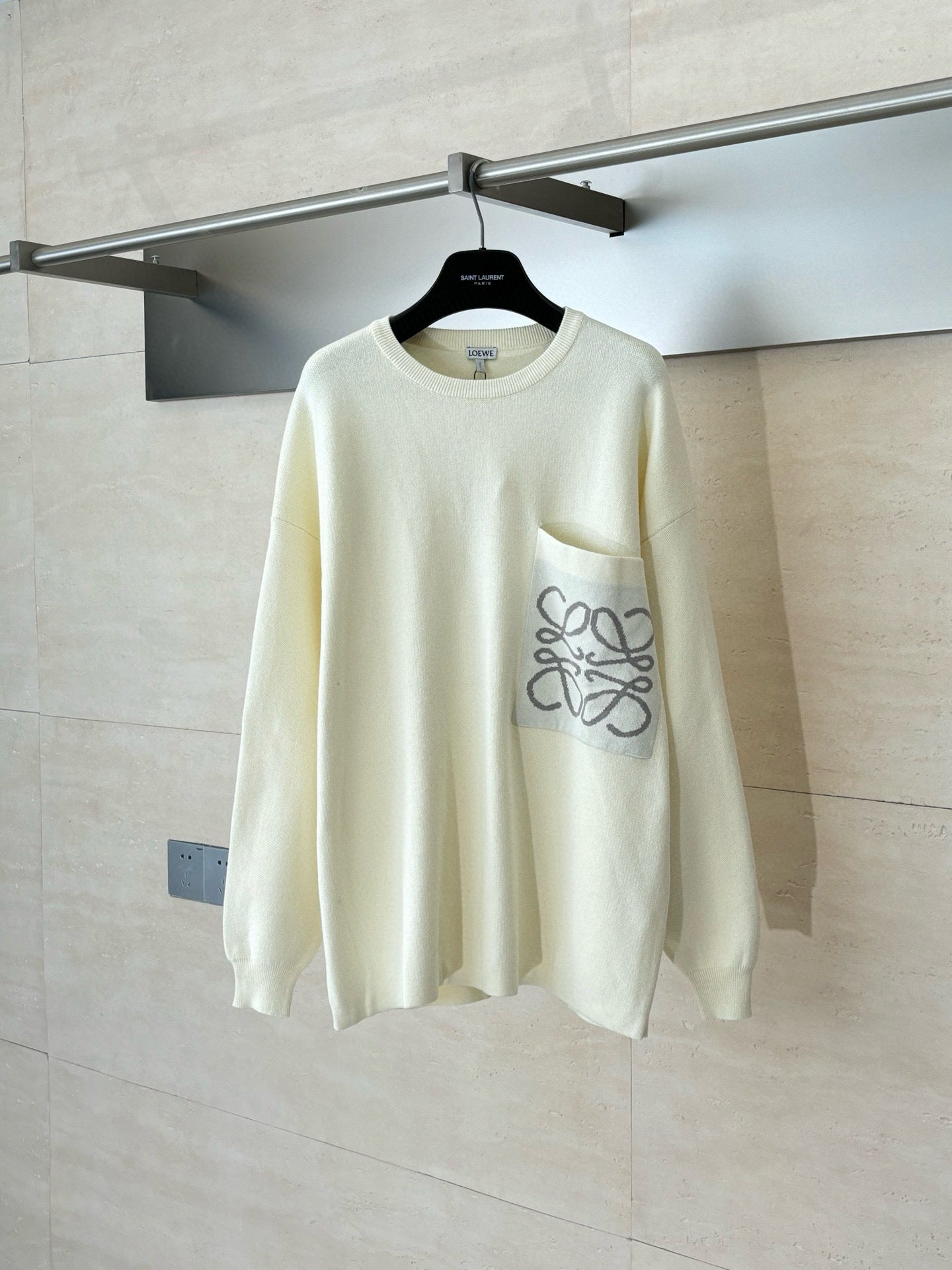 Pull coton poche Anagram Loew 10/10