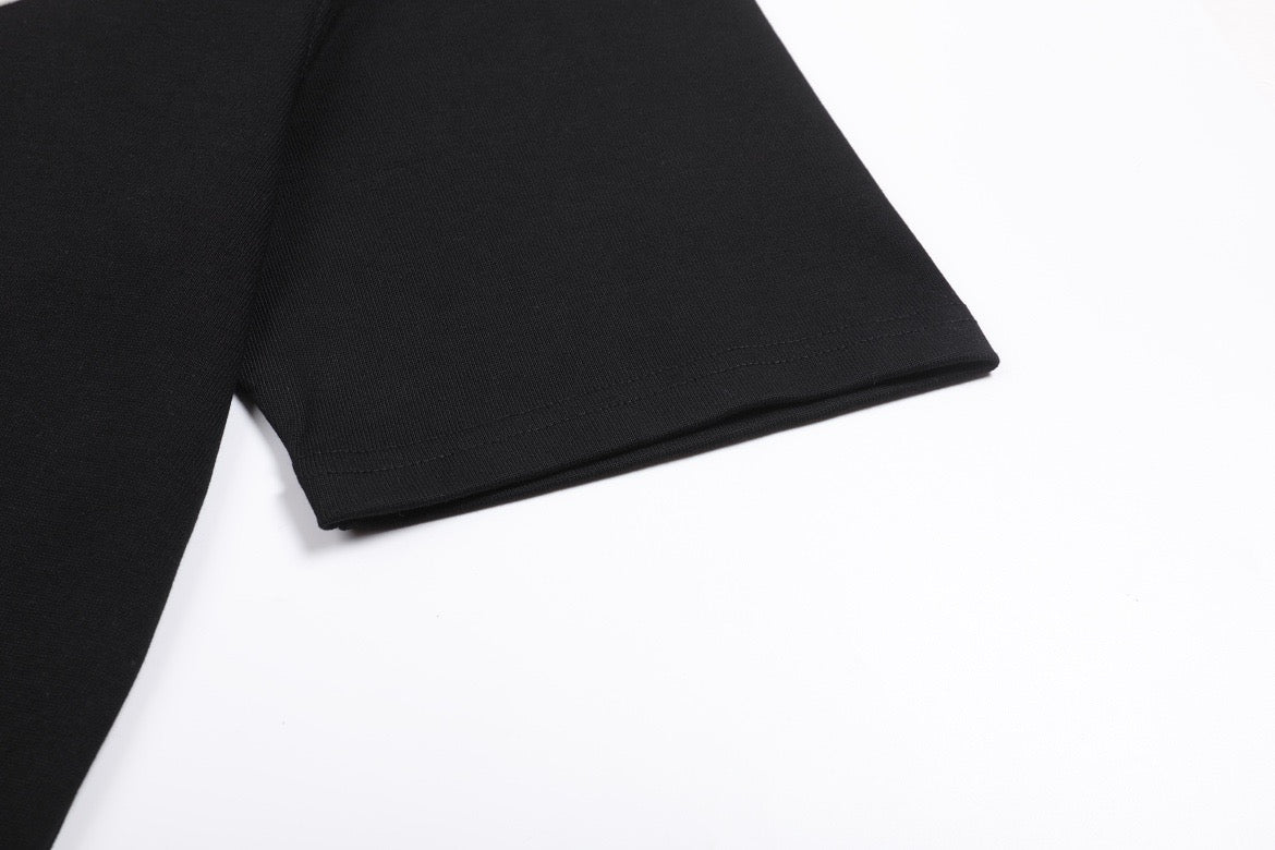 T-shirt noir à logo ami de cœur rouge