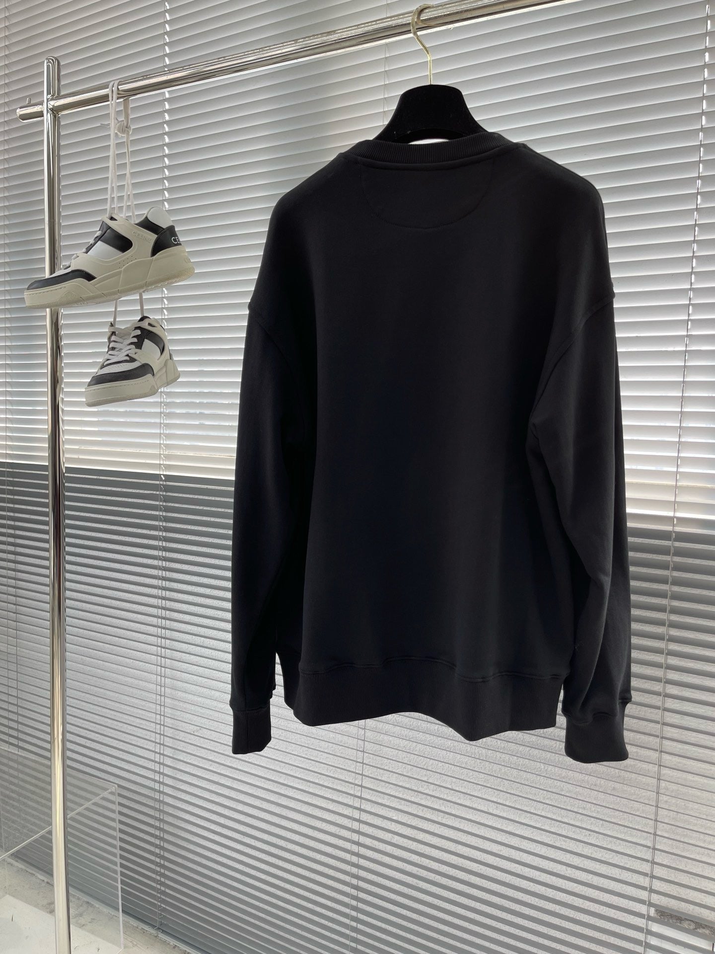Pull FF noir poche zippée
