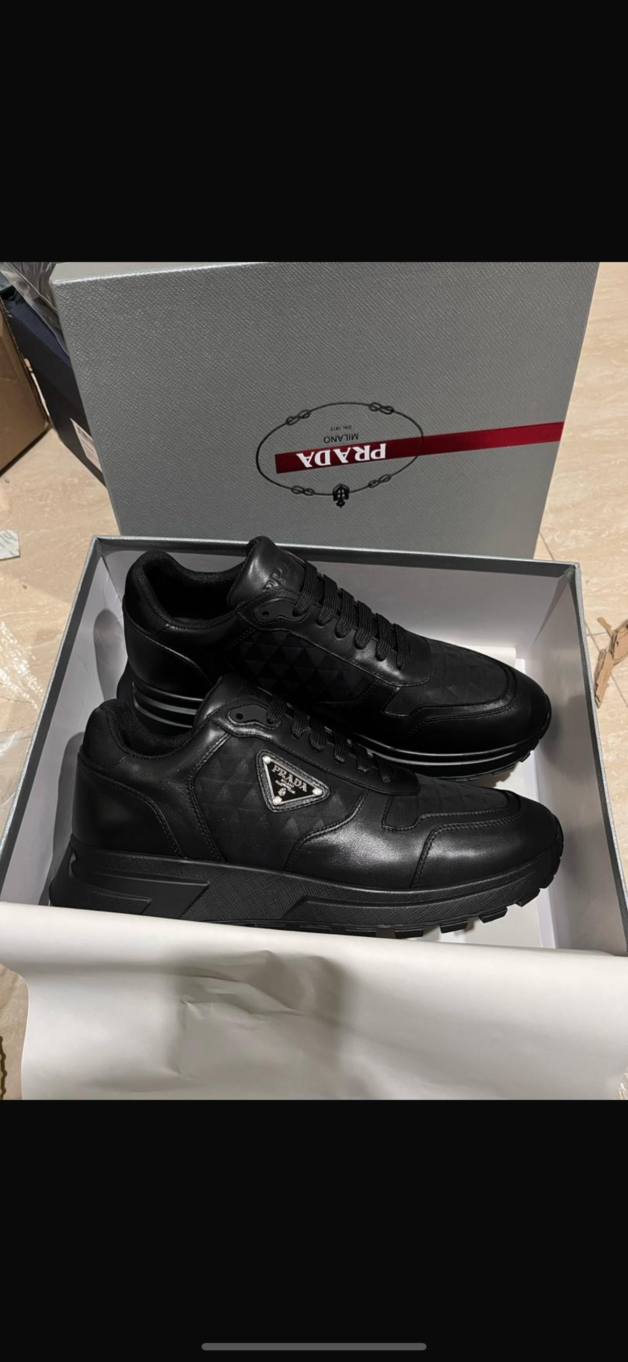 Baskets montantes en cuir et Re-Nylon